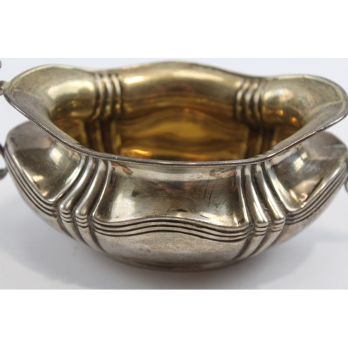 30 - A silver two handled sugar bowl, Sheffield 1908, 15.5cm across the handles, 107gm