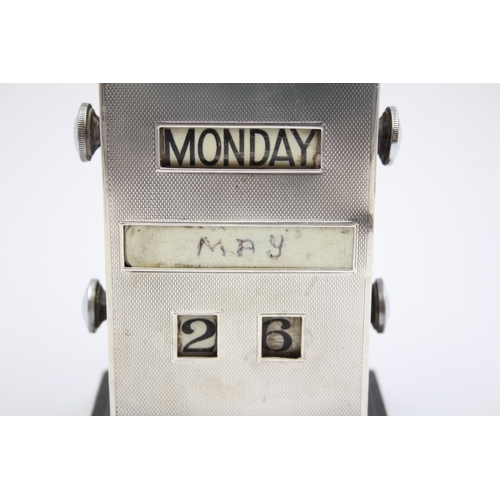 35 - An Art Deco silver mounted desk calendar, Birmingham 1938, with revolving day and date, 12cm