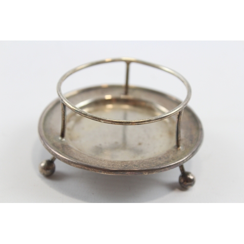 36 - A silver tea strainer on stand, Sheffield 1917, 10.5cm across handles, 79gm