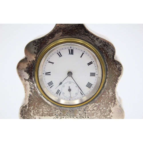 43 - A silver desk timepiece, Birmingham 1916, initialled and dated, 9.5cm.