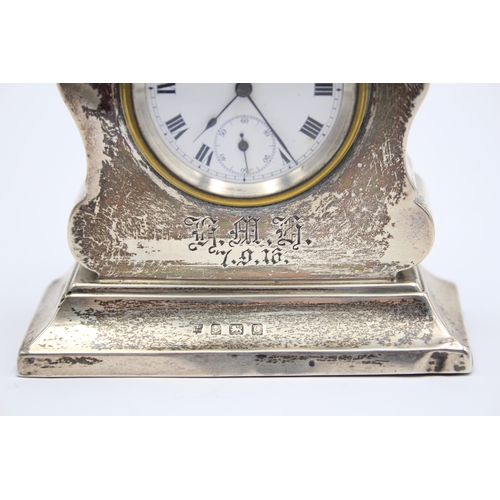 43 - A silver desk timepiece, Birmingham 1916, initialled and dated, 9.5cm.