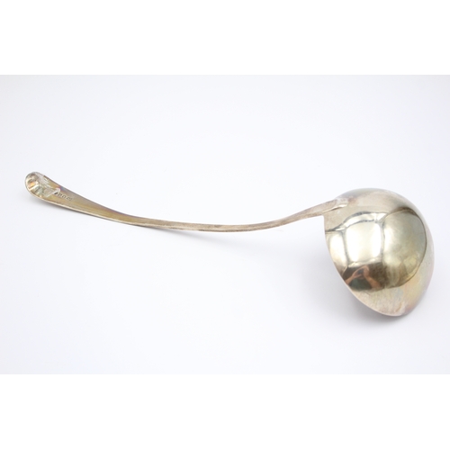 47 - A George III silver Old English and thread pattern soup ladle, London 1797, crested, 31cm, 165gm