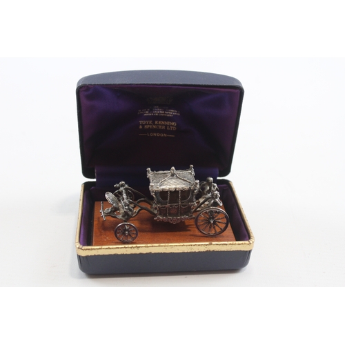 48 - A cast silver limited edition commemorative Silver Jubilee Coronation cast coach, by Toye, Kenning &... 