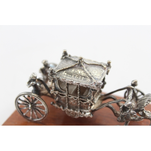 48 - A cast silver limited edition commemorative Silver Jubilee Coronation cast coach, by Toye, Kenning &... 