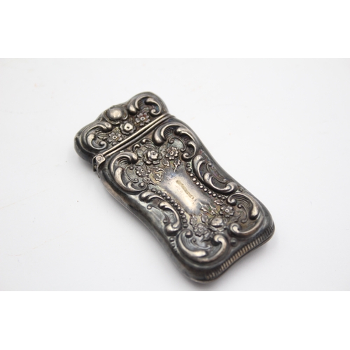 54 - A sterling silver embossed vesta case, 6 x 3cm, 17gm