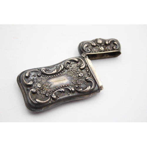 54 - A sterling silver embossed vesta case, 6 x 3cm, 17gm