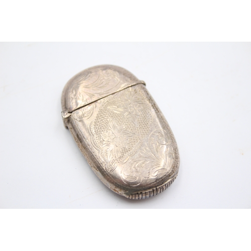 55 - A silver vesta case, Sheffield 2000, with floral engraved decoration, 6 x 3.5cm, 24gm