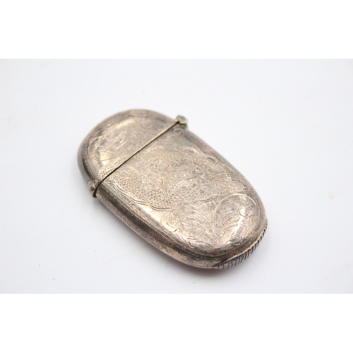 55 - A silver vesta case, Sheffield 2000, with floral engraved decoration, 6 x 3.5cm, 24gm