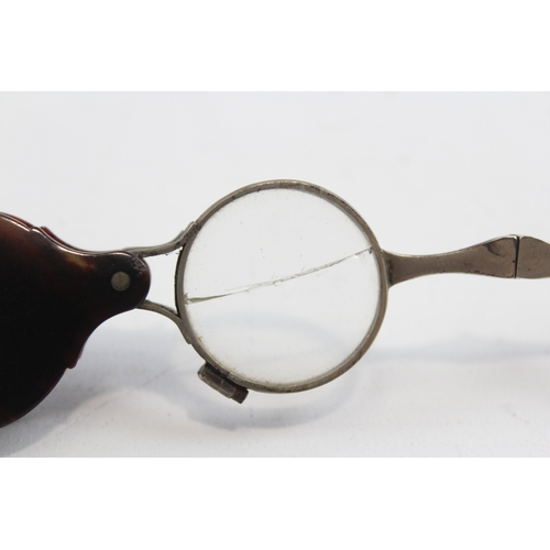 60 - A 19th century pair of unmarked silver and tortoiseshell lorgnettes, 6.5cm closed