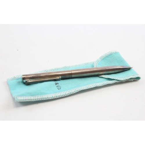 68 - Tiffany & Co, Germany, a silver biro, 31gm, 13.5cm, soft pouch