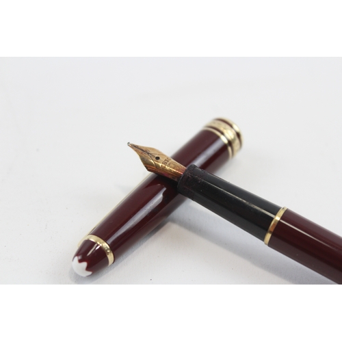 67 - Mont Blanc, a Meisterstück Classique burgundy fountain pen with 14K gold nib