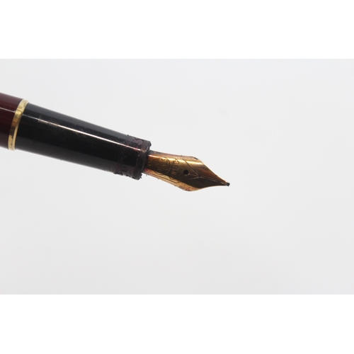 67 - Mont Blanc, a Meisterstück Classique burgundy fountain pen with 14K gold nib