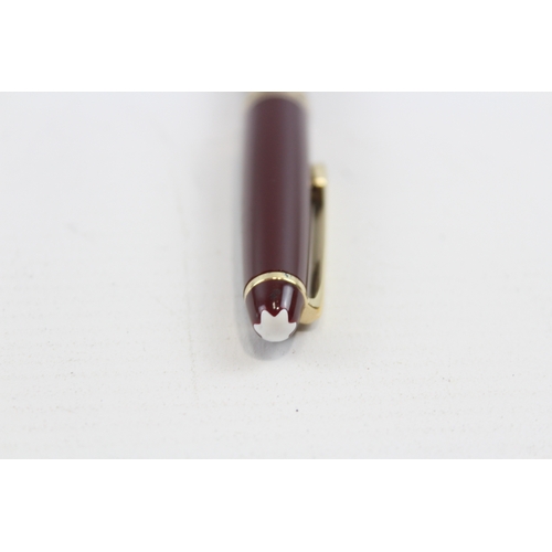 67 - Mont Blanc, a Meisterstück Classique burgundy fountain pen with 14K gold nib