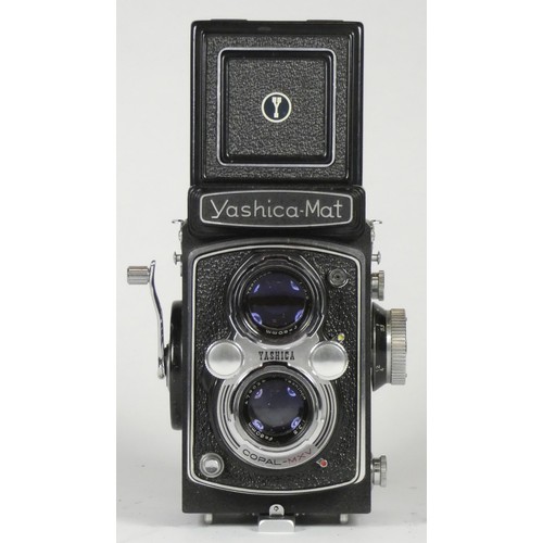 A Yashica-Mat Copal MXV TLR medium format camera, with a Yashimon 80mm f3.5  lens, with leather carry