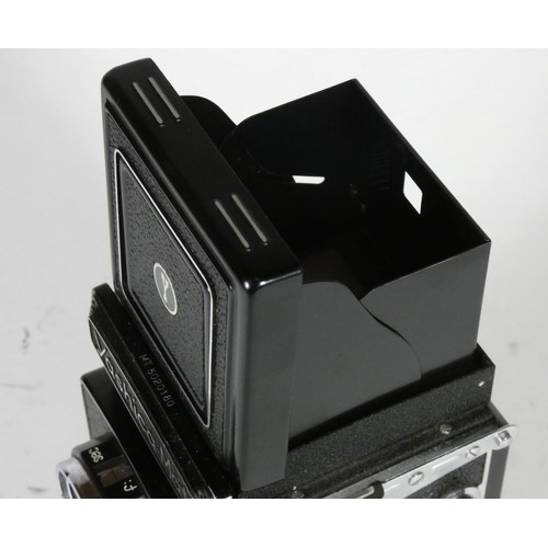 A Yashica-Mat Copal MXV TLR medium format camera, with a Yashimon