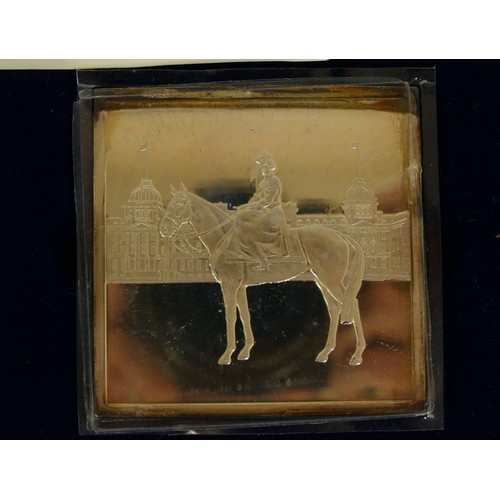 124 - Danbury Mint, a silver limited edition stamp Queens Official Birthday ingot, 122gm, case