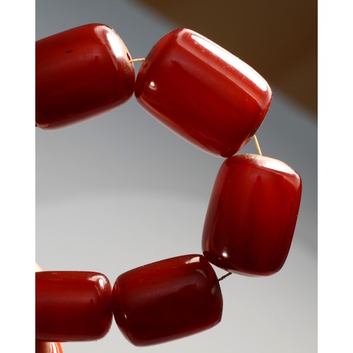 143 - A cherry red amber Bakelite graduated bead necklace, 25 - 12mm beads, 92cm, 96gm