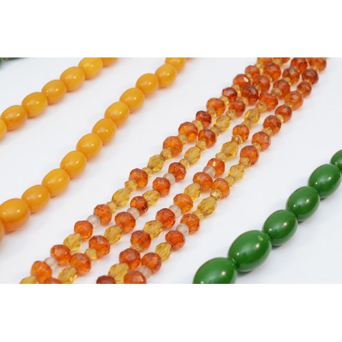 145 - A honey amber Bakelite graduated bead necklace, 27 - 10mm beads, 58cm, 86gm and other bead necklaces... 