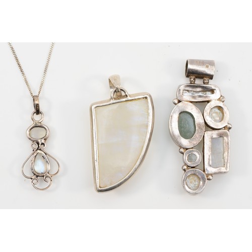 160 - A silver, quartz and pearl pendant,and two other quartz pendants, 5.5cm, 39gm