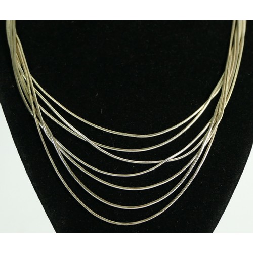 162 - A seven row silver rope twist necklace, 39cm, 28gm, case