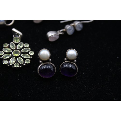 168 - Two silver and gemset pendants, three pairs of ear rings and a ring, 63gm