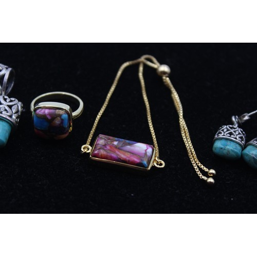 170 - A silver and turquoise pendant and ear ring set, and a silver gilt pendant and ring, 40gm