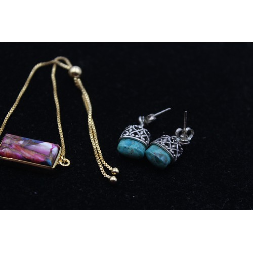 170 - A silver and turquoise pendant and ear ring set, and a silver gilt pendant and ring, 40gm