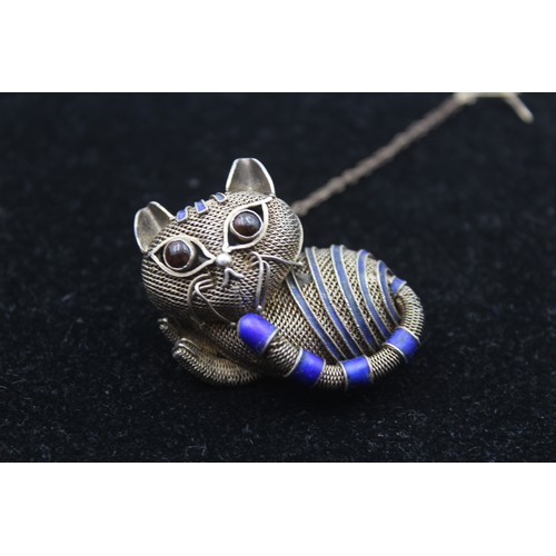 171 - A Chinese silver and enamel cat brooch, 36mm and a Chinese silver and tigers eye ring, 23gm