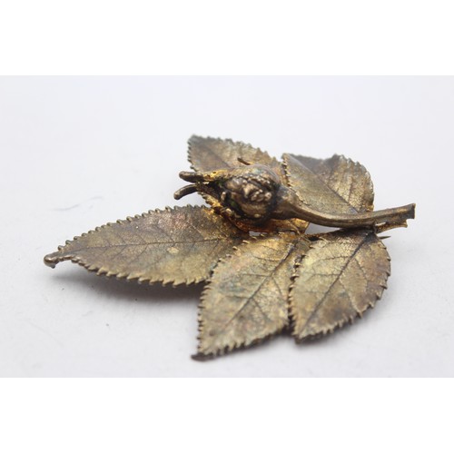 181 - Flora Danica, a Danish silver gilt rose brooch, 71mm and another in the form of a leaf.