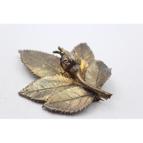 181 - Flora Danica, a Danish silver gilt rose brooch, 71mm and another in the form of a leaf.