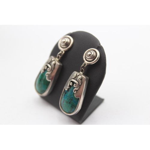 184 - A silver and turquoise matrix type of stone necklace and ear rings, 56gm