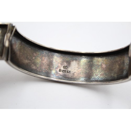 188 - A Victorian silver hinged bangle, Birmingham 1882, 58 x 49mm, 29gm