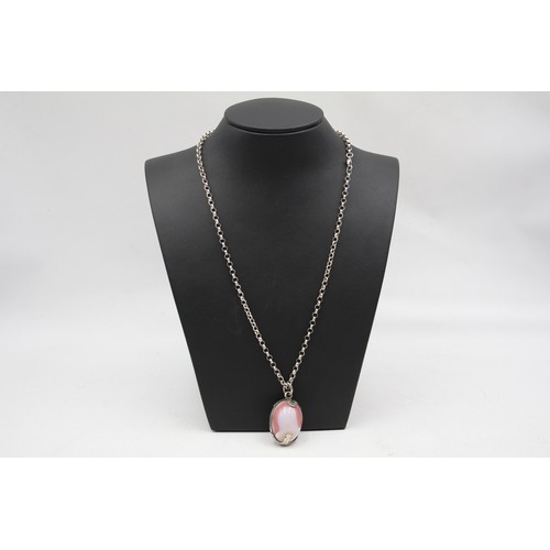 192 - A silver and agate egg shape pendant, 28 x 20mm, chain, 34gm