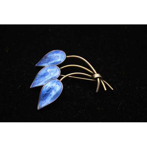 193 - Ivor Holth, a Norwegian silver gilt and enamel three leaf brooch, 52 x 41mm, 11gm