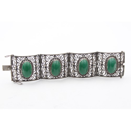 195 - A low grade silver and green cabochon bracelet, control marks, 16.5cm, 76gm