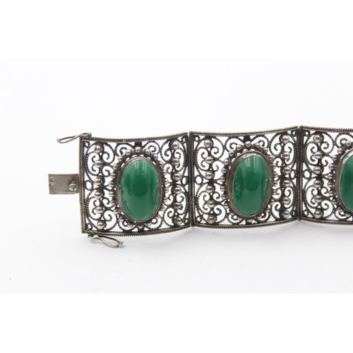 195 - A low grade silver and green cabochon bracelet, control marks, 16.5cm, 76gm