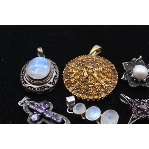 199 - Eight various silver and gemset pendants, including citrine and moonstone, 74gm