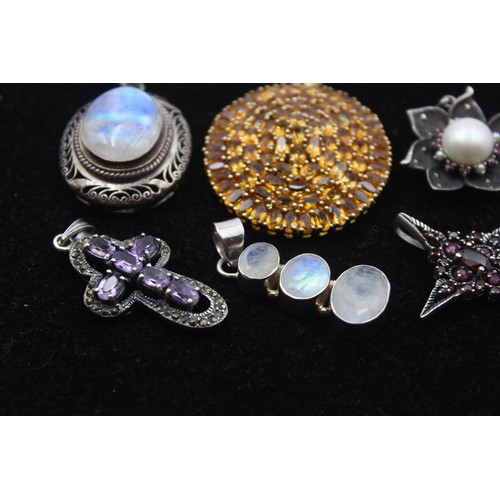 199 - Eight various silver and gemset pendants, including citrine and moonstone, 74gm