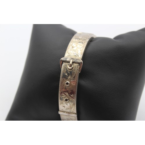 205 - A vintage silver hinged buckle bracelet, Birmingham 1964, 12mm wide, 64 x 57mm, 24gm