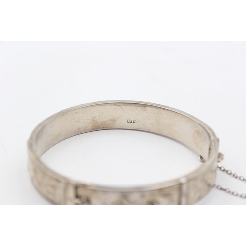 205 - A vintage silver hinged buckle bracelet, Birmingham 1964, 12mm wide, 64 x 57mm, 24gm