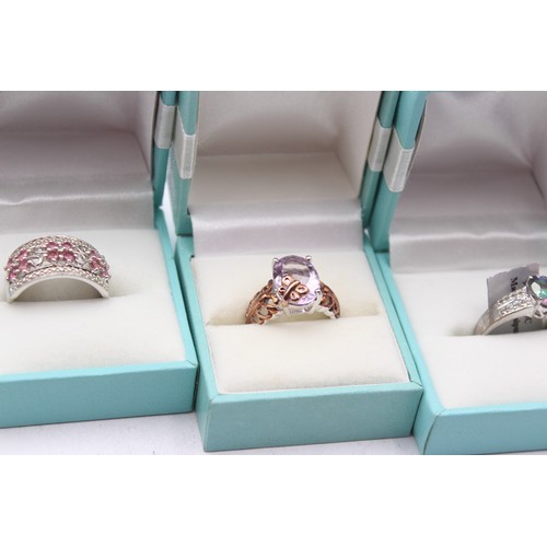 209 - Five silver and gemset rings, including amethyst, 27gm, boxes