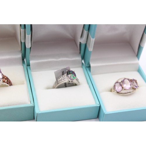 209 - Five silver and gemset rings, including amethyst, 27gm, boxes