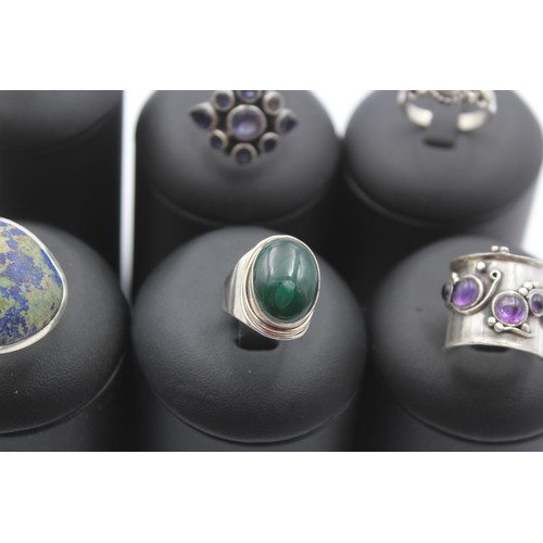 212 - Six silver and gemset rings, including malachite, 55gm