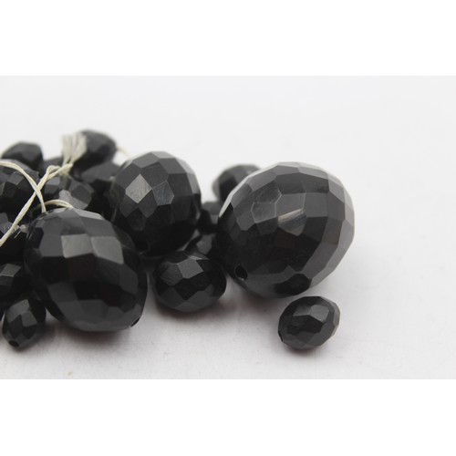 217 - A Victorian faceted Whitby Jet graduated necklace, the largest 30mm, needs restringing