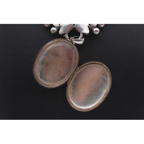 218 - A Victorian silver back and front locket, 44 x 34mm, and silver collar, c.1880/90, 92gm