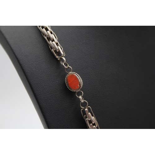 220 - An unmarked silver and coral necklace, 65cm, 65gm