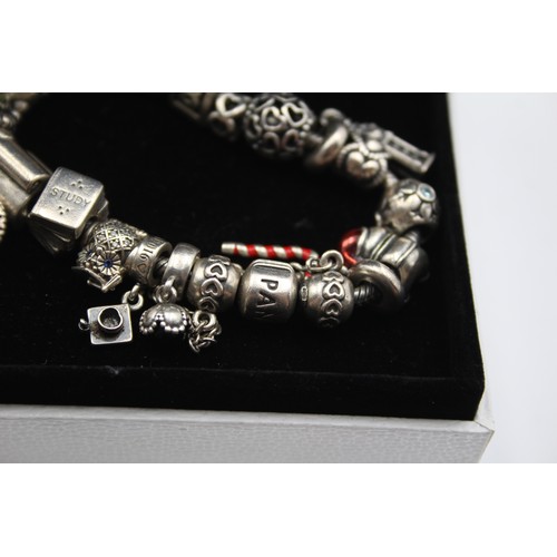 222 - Pandora, a silver charm bracelet, 83gm, box