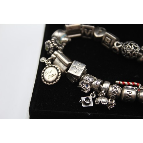 222 - Pandora, a silver charm bracelet, 83gm, box