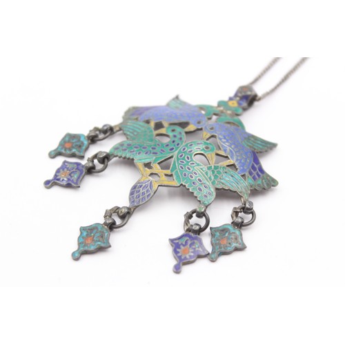 224 - Murlidhar Multan, an Indian Rupee silver and enamel bird pendant, 8 x 6cm, chain, 42gm