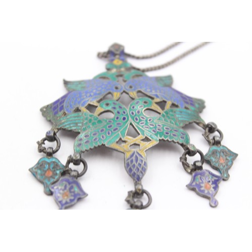 224 - Murlidhar Multan, an Indian Rupee silver and enamel bird pendant, 8 x 6cm, chain, 42gm